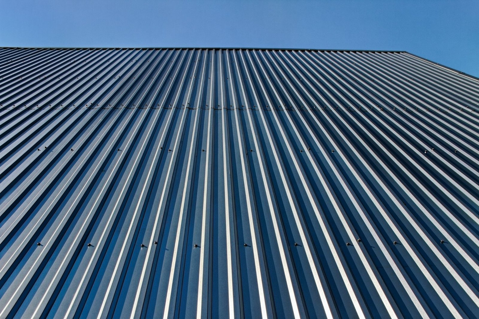 Standing seam metal roofing panels